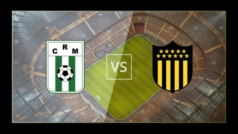 Cầu thủ Racing Montevideo và Penarol tranh chấp bóng trên sân Cầu thủ Racing Montevideo và Penarol tranh chấp bóng trên sân